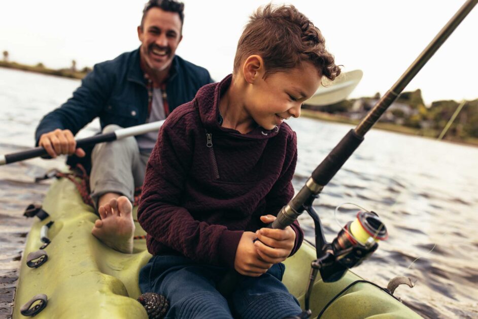 Dad and Son kayak fishing