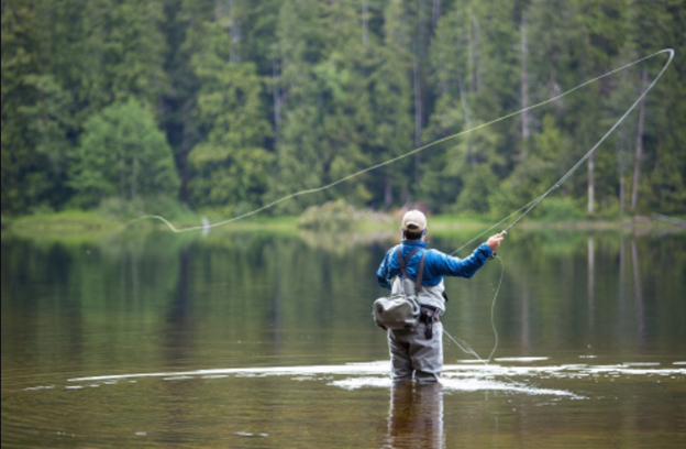 man fly fishing with long rod length