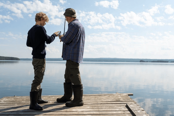 Getting ready to fish on a pier wearing waterproof boots